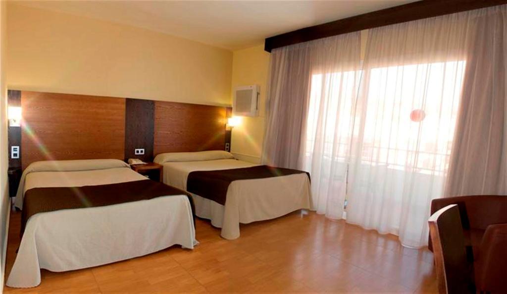 Quadruple Room (2 Adults + 2 Children)