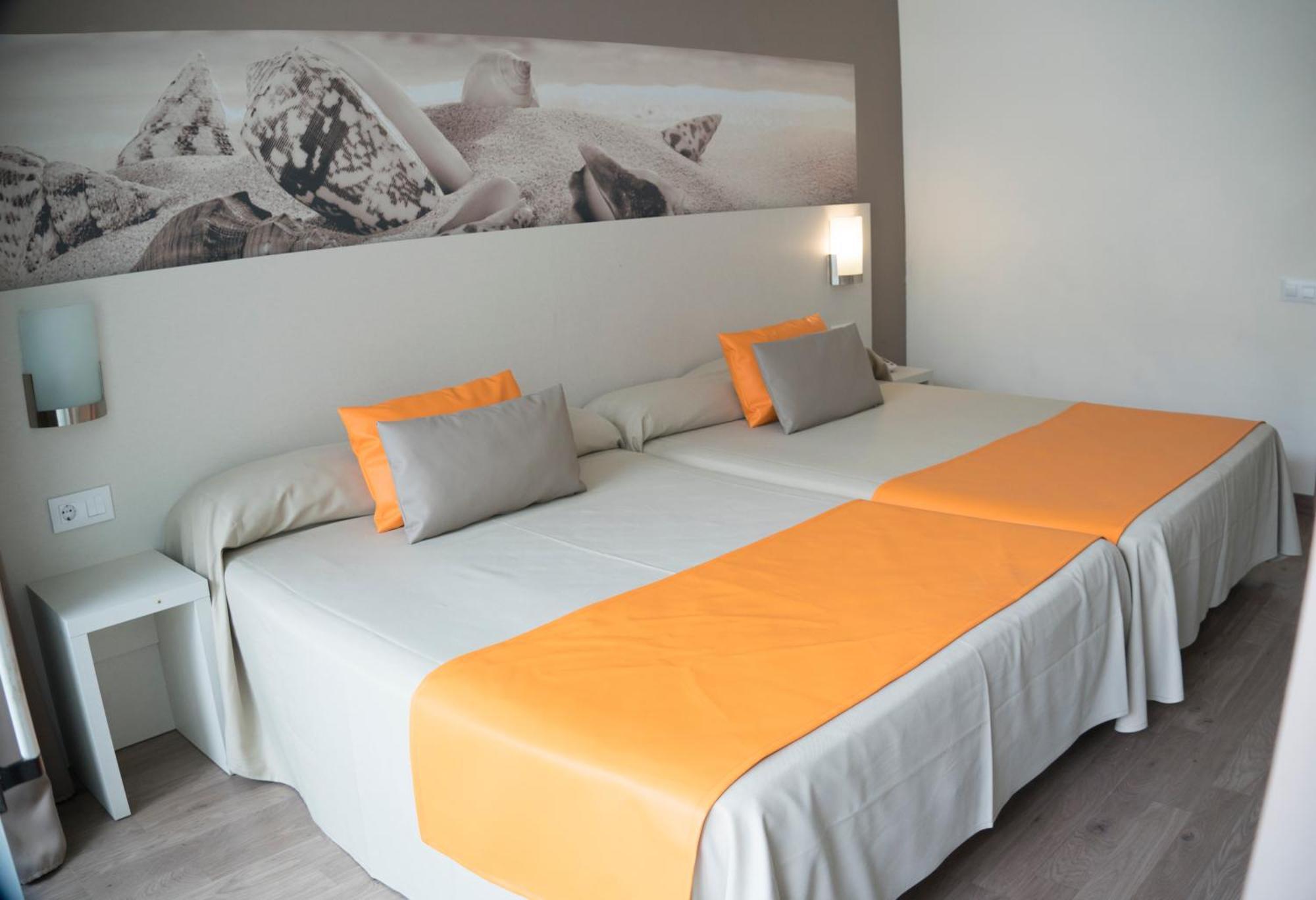 Quadruple Room (2 Adults + 2 Children)