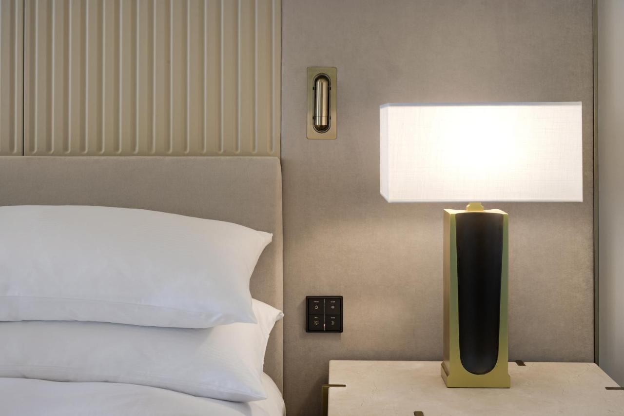 Deluxe Queen Room with Two Queen Beds and Courtyard View