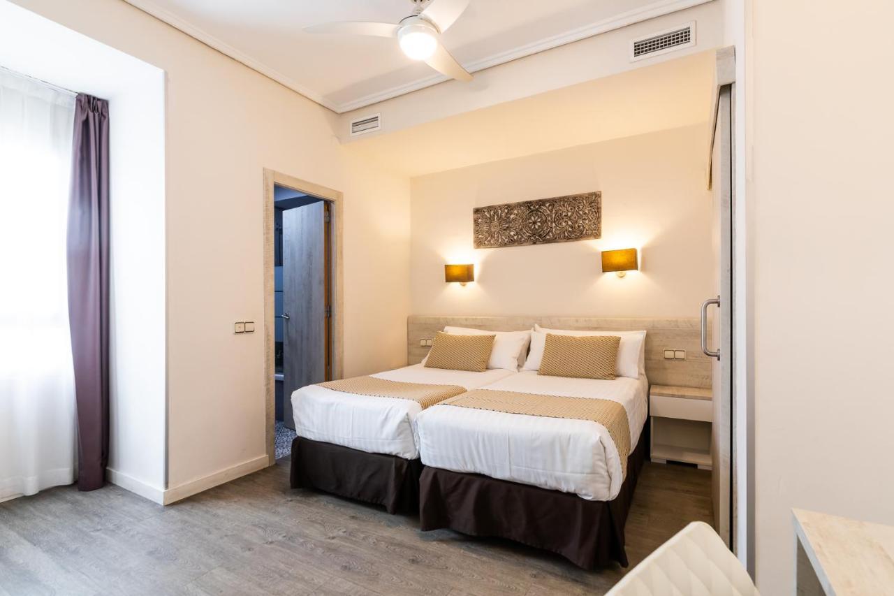 Quarto Triplo (3 Adultos)
