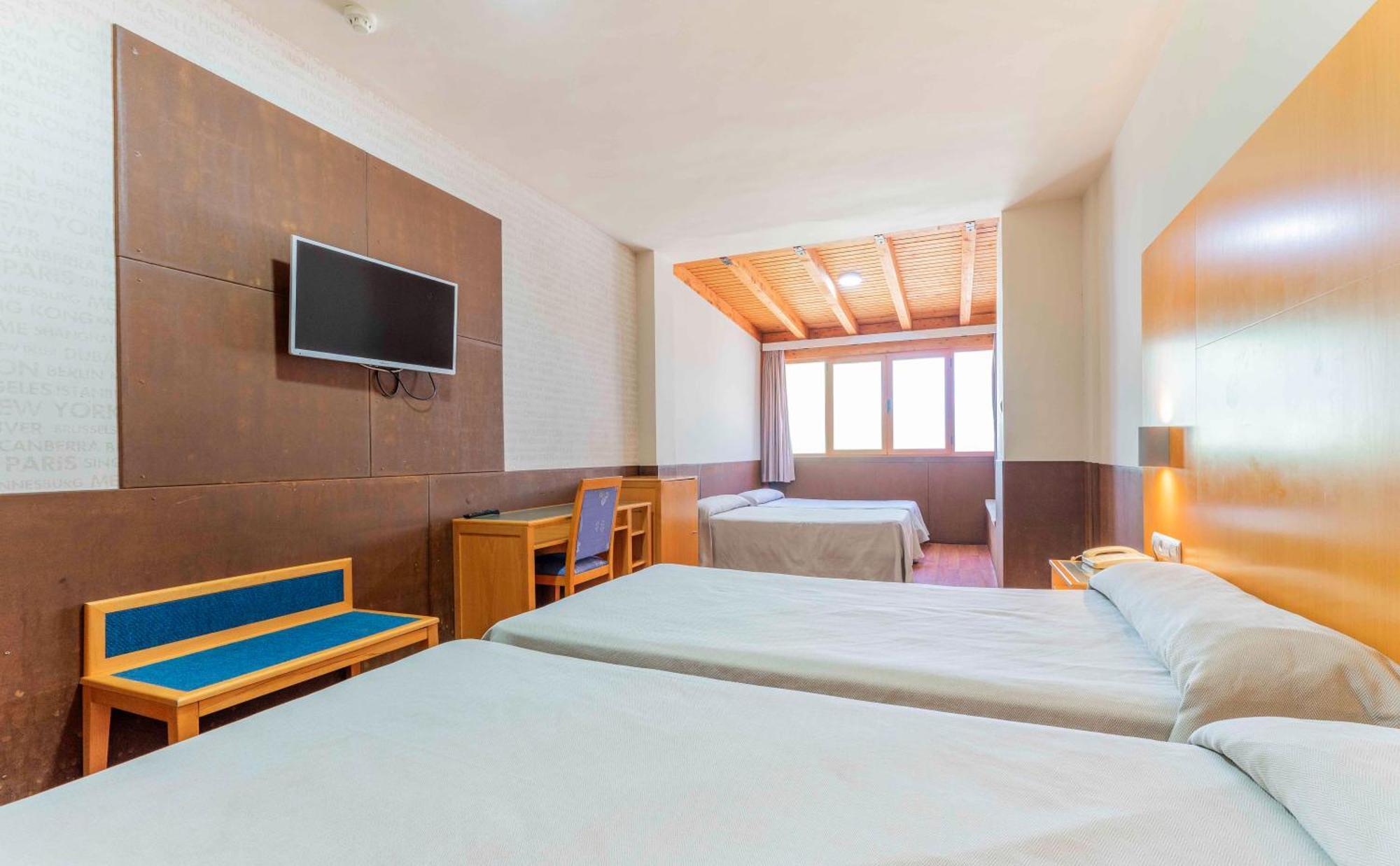 Quadruple Room (2 Adults + 2 Children)