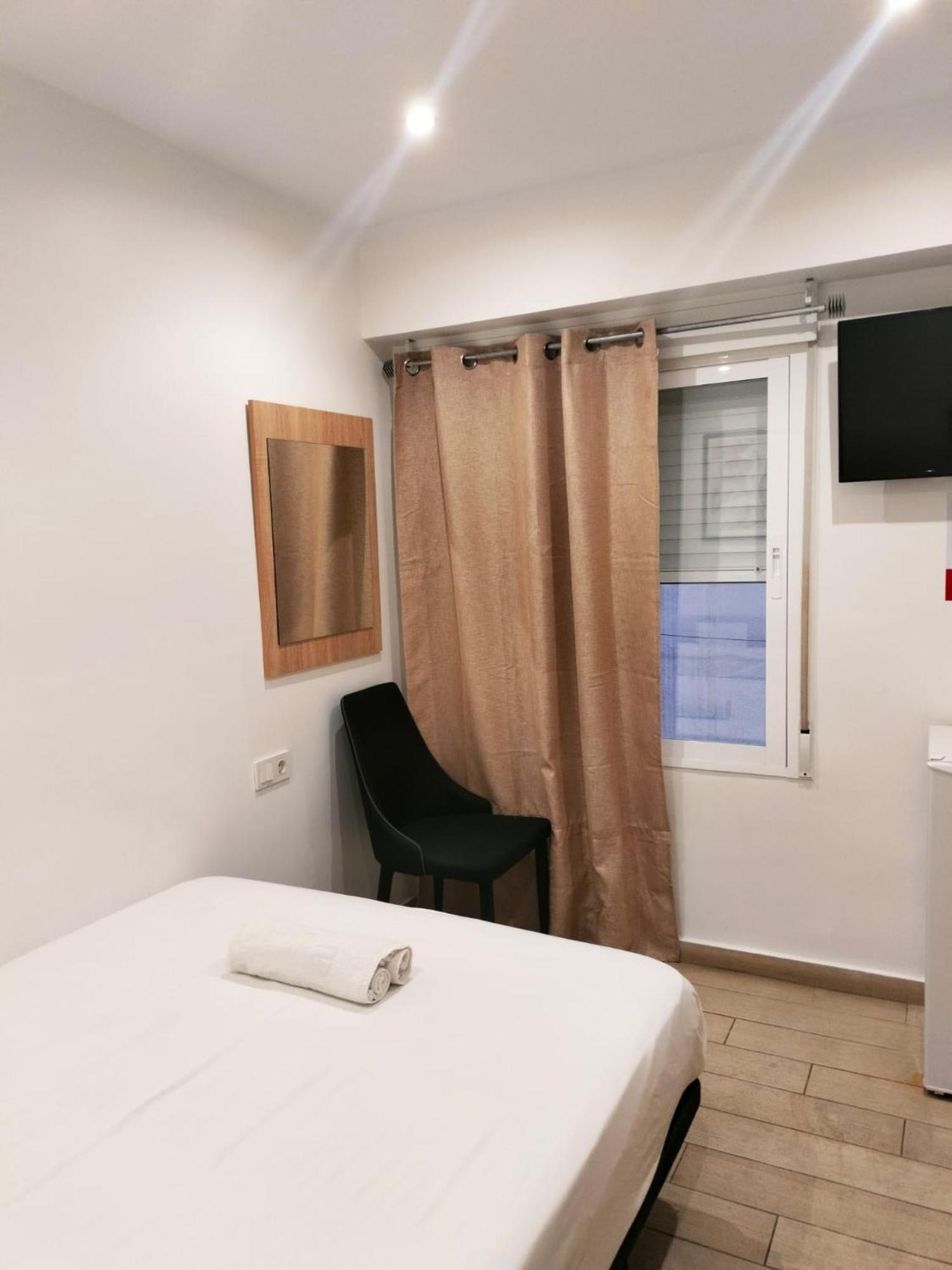 Tweepersoonskamer met 1 of 2 Bedden en Gedeelde Badkamer