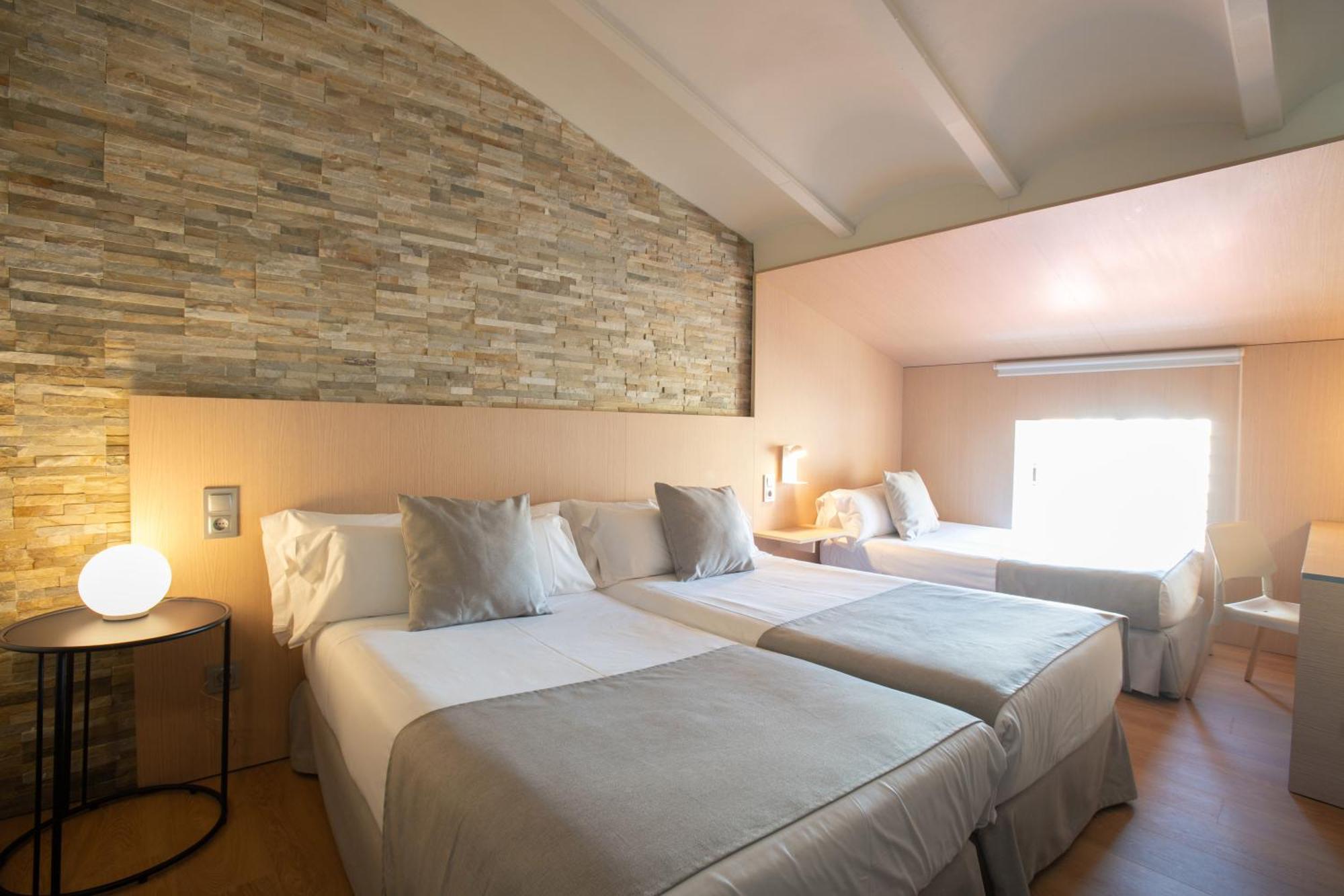 Triple Room (2 Adults + 1 Child)