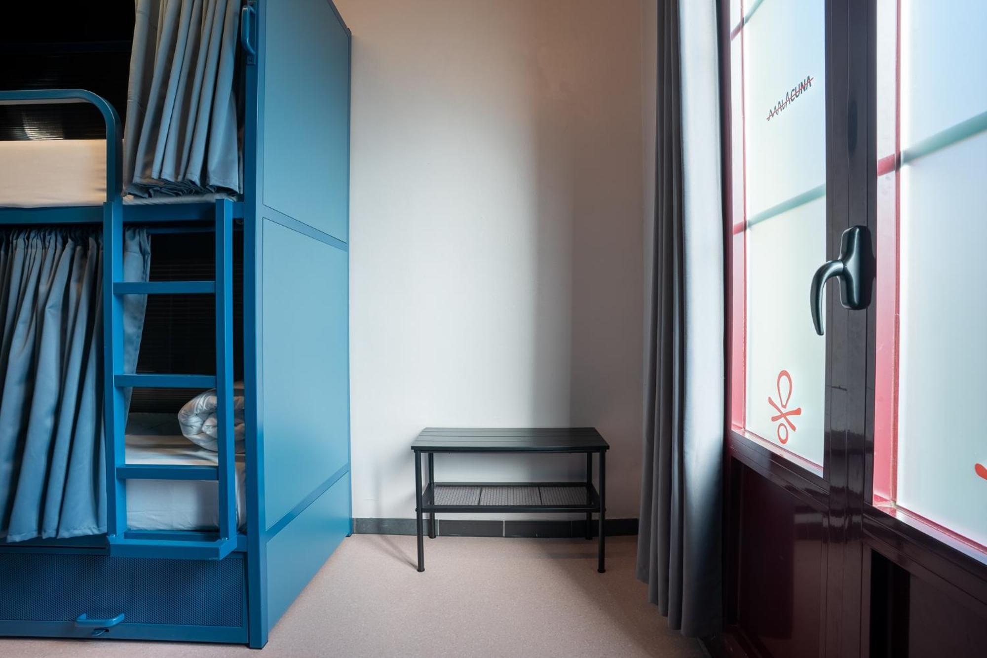 Bed in  8 Beds Room with Private Bathroom and AirC