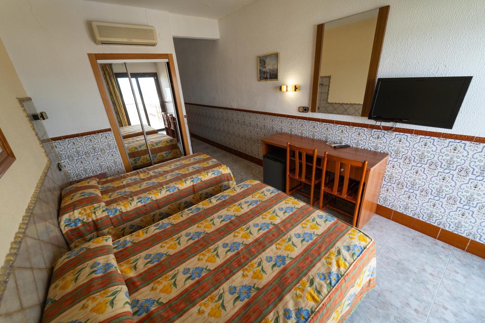 Quadruple Room (2 Adults + 2 Children)