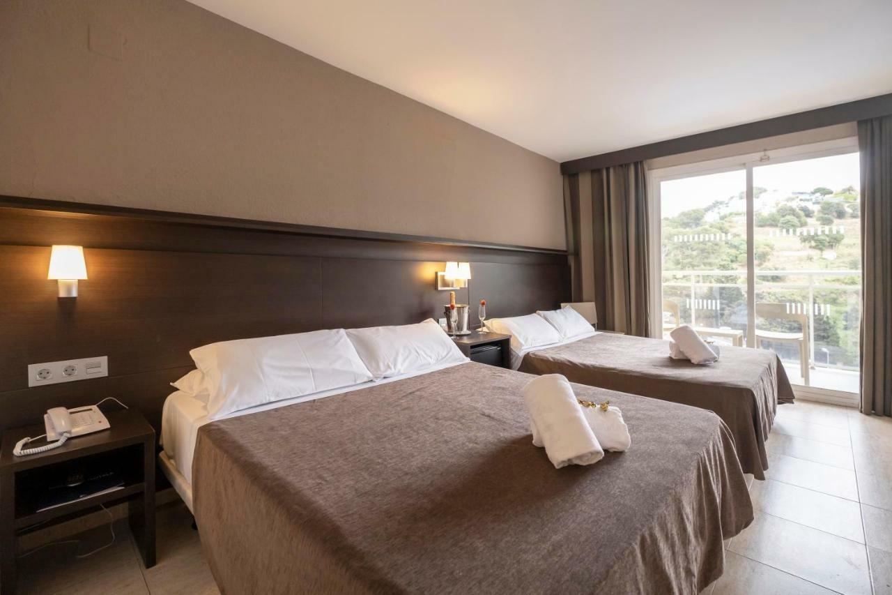 Tweepersoonskamer met extra bed (2 volw. + 2 kinderen)