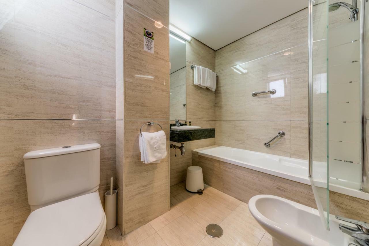 Quadruple Room (3 Adults + 1 Child)