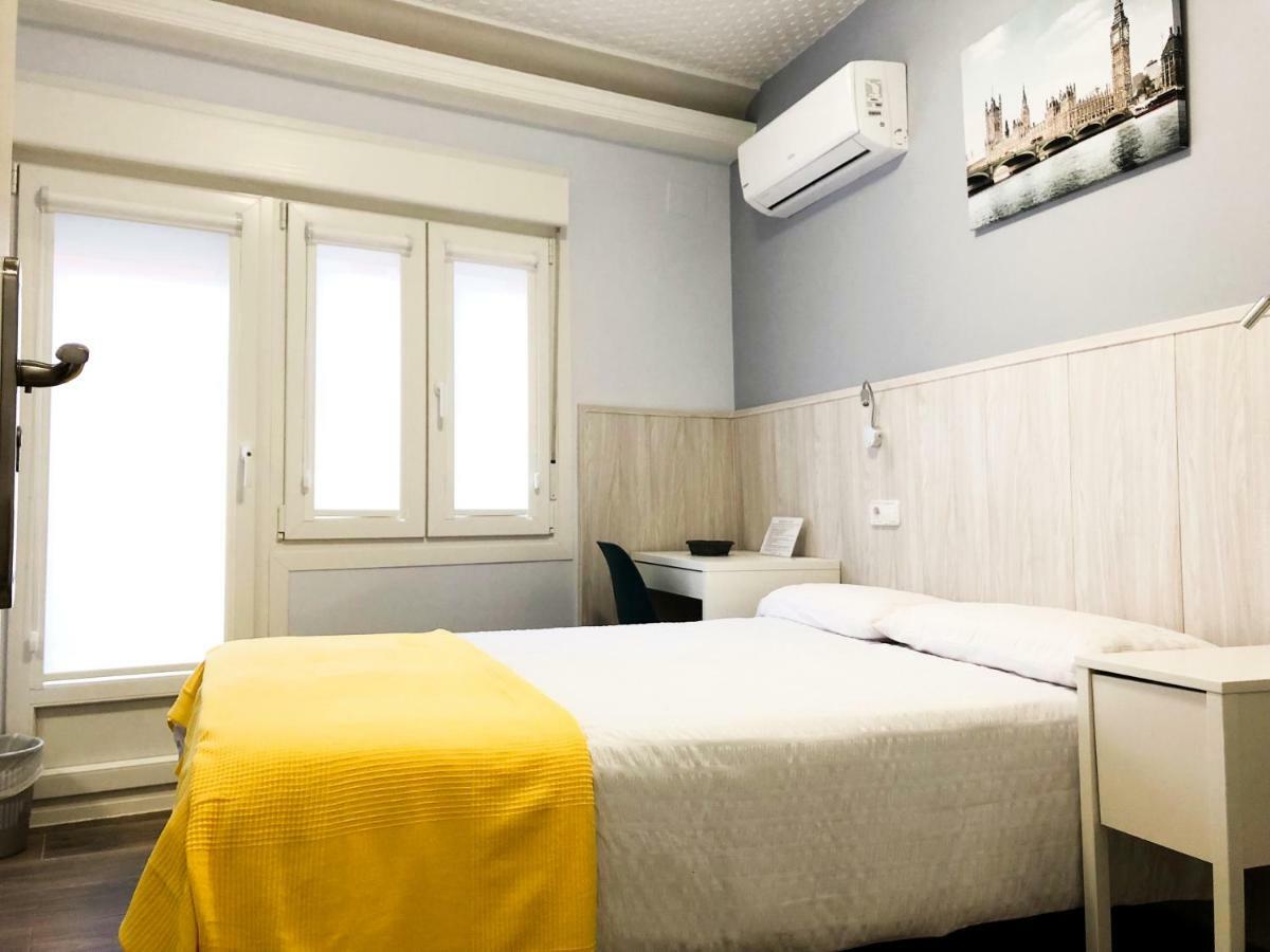 Habitación Doble con aseo compartido
