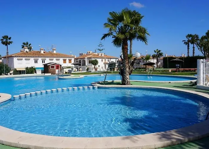 Costa Blanca Bungalow Lago jardin frente piscina 4 personas #PRP001 by Stay Orihuela Costa