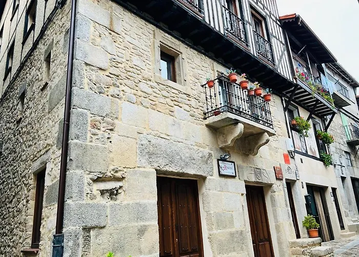 Apartamentos Raíces