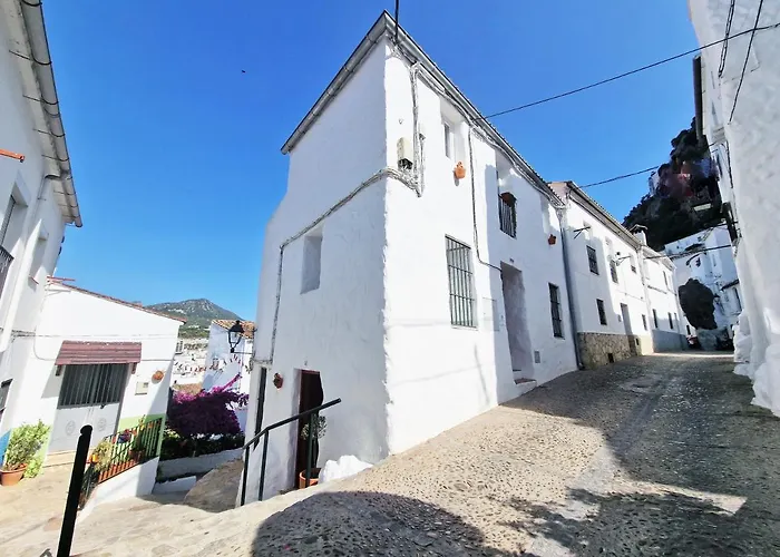 EL BOTIJO Las puertitas rojas