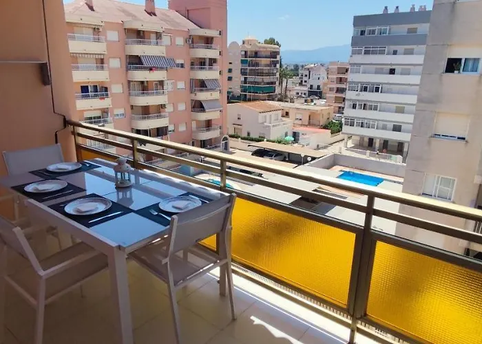 Acogedor apartamento en Daimús a 150 metros de la playa con parking privado y piscinas comunitarias