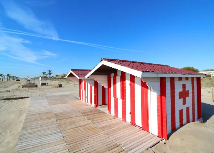 Global Properties, Moderno apartamento con piscina y terraza en la playa de Canet