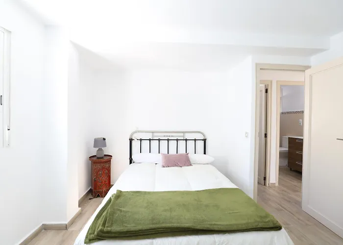 2 apartamentos en una excelente villa de playa compartiendo Piscina y Jardín
