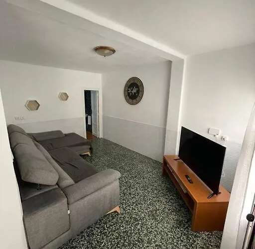 Casa dos pisos con terraza