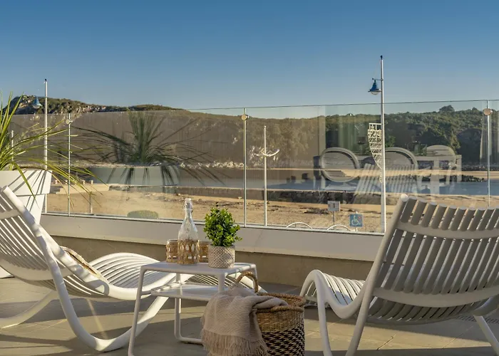 Alojamientos Turísticos Puerto de Suances junto a la playa, terraza y garaje privado