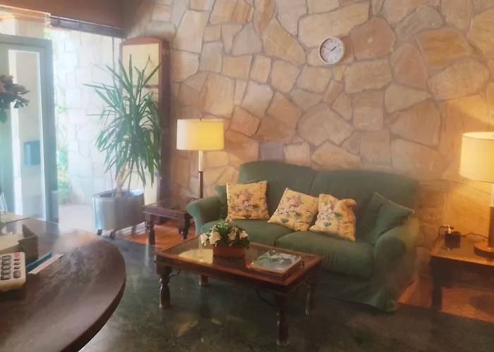 Habitación triple con bañera y terraza HOTEL SUITE MIOÑO
