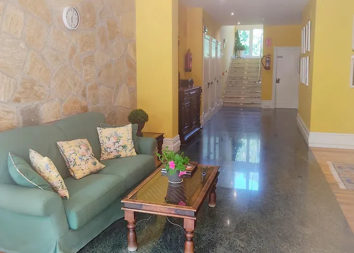 Habitación triple con bañera y terraza HOTEL SUITE MIOÑO