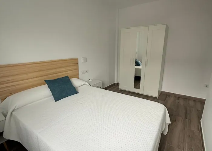 Apartamentos Bolonia - M a n u e l a