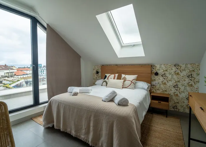 Alojamientos Turísticos Puerto de Suances junto a la playa, terraza y garaje privado