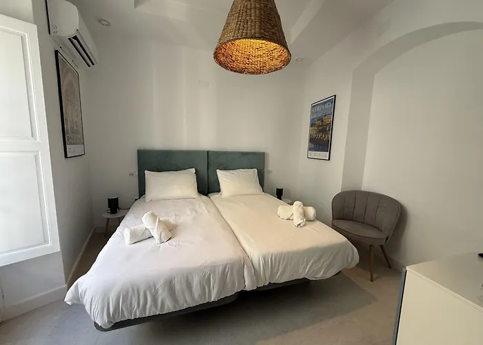 Casa Cristóbal Colón habitaciones con vistas a Semana Santa y Fiestas
