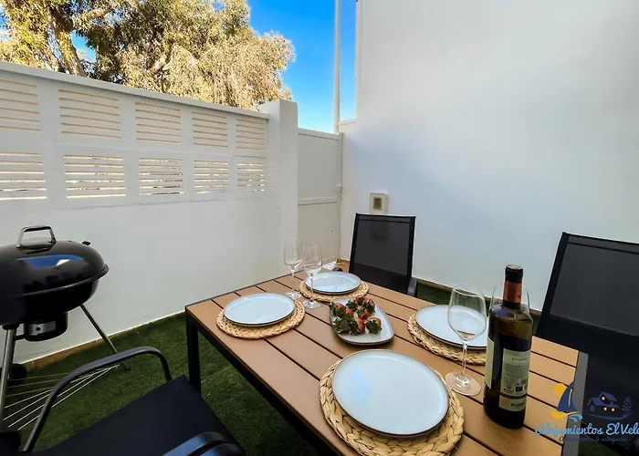 Dúplex a 350 metros de la playa con piscina y garaje con BBQ