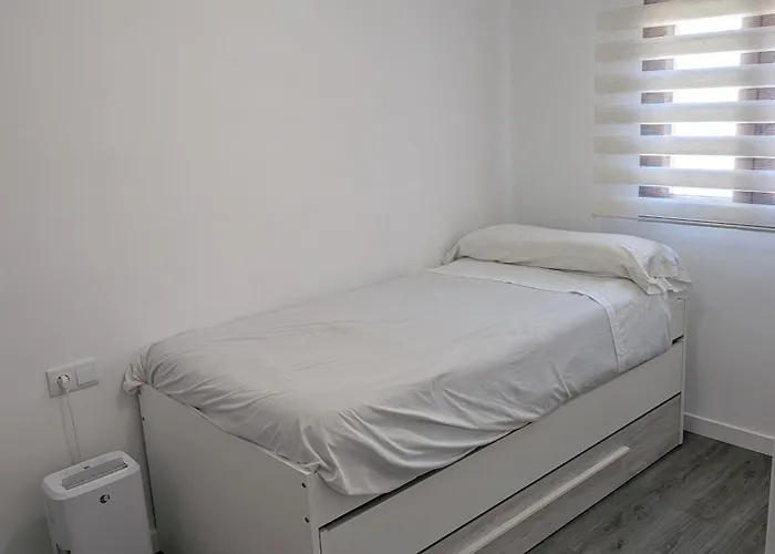 Casa dos pisos con terraza