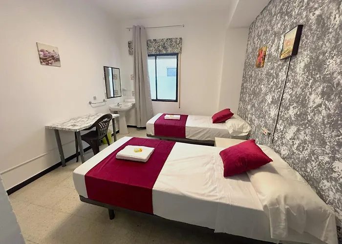 Evans Realty - Hostal
