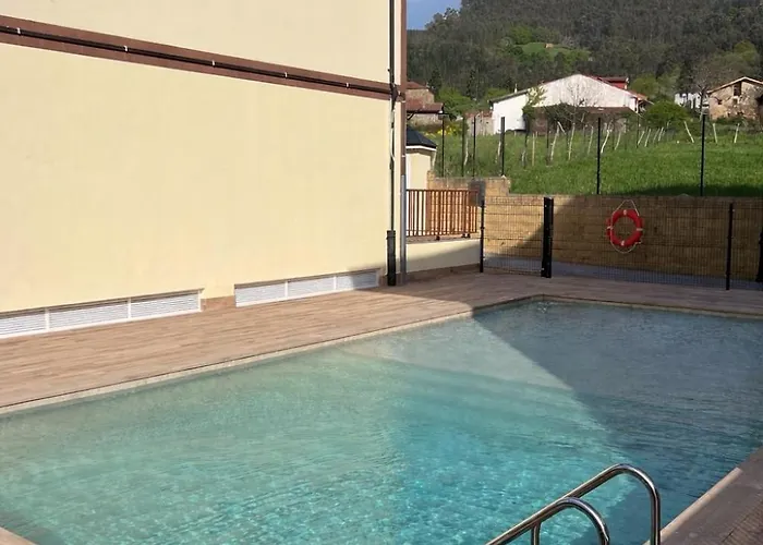 Duplex con piscina y parking privado Limpias